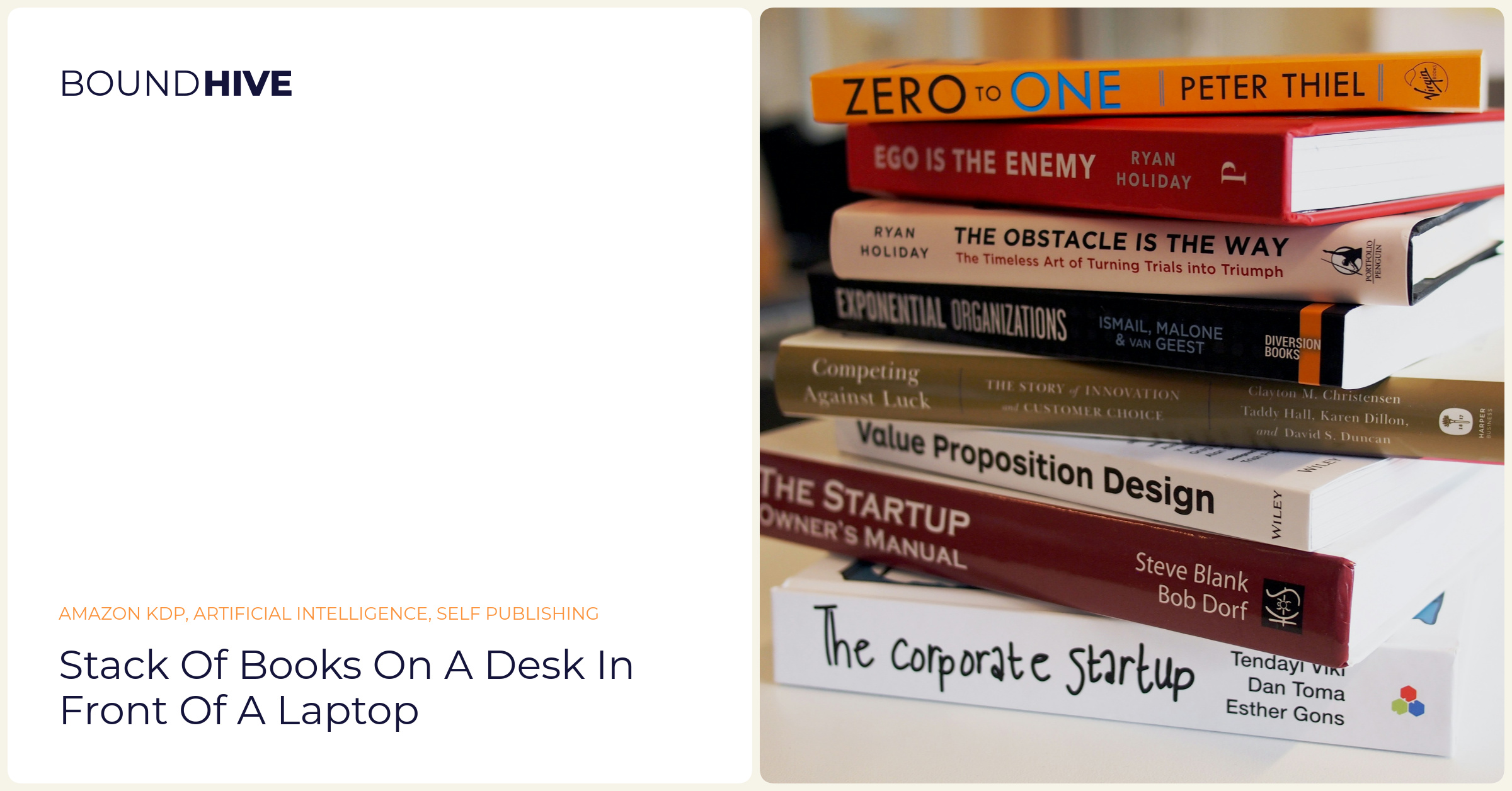 Stack of books on a desk in front of a laptop